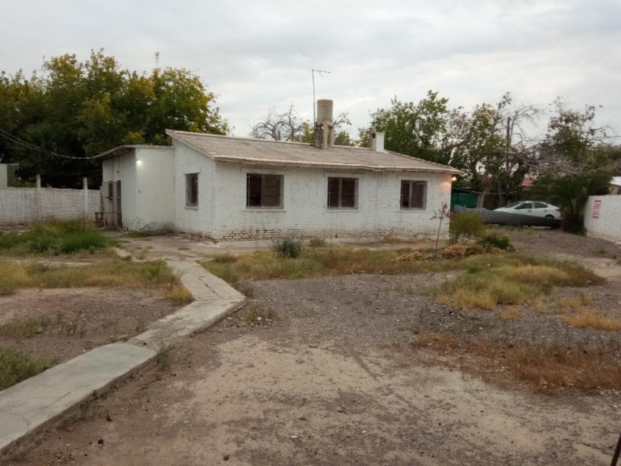 Barrio Obrero Rawson Lote De 1000 M2 Dos Propiedadedes . Casa  Original Con Ampliociones Y Departamento  De Dos Dormitor