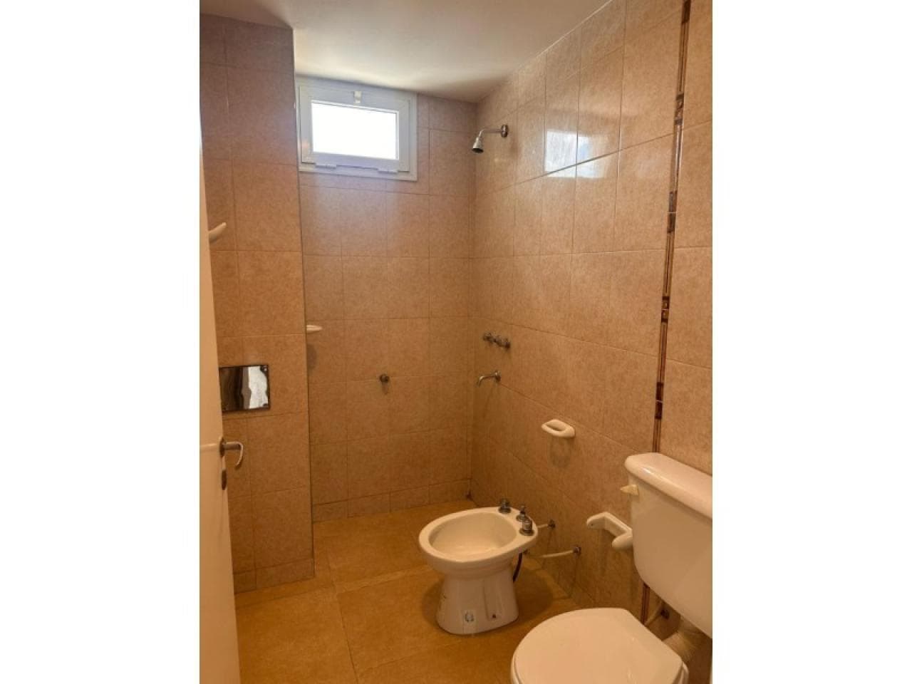 Rivadavia Departamento 1 Dormitorio, Planta Baja, Cochera. 40.000 Usd/ Telf 264 6296308